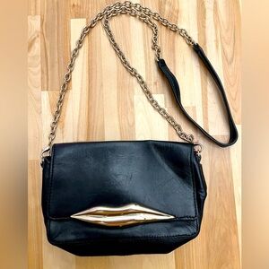 Diane von Furstenberg runway lips crossbody